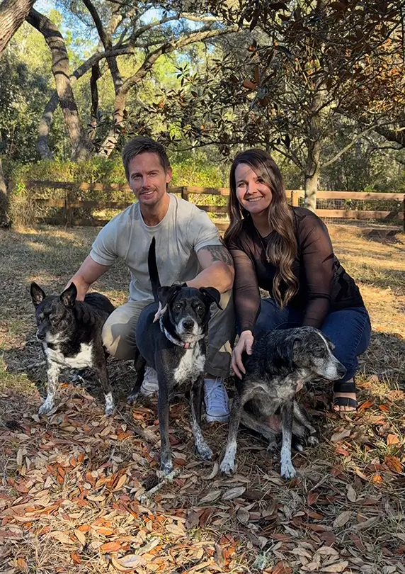 Jeremy and Kelsea Marshall with their dogs